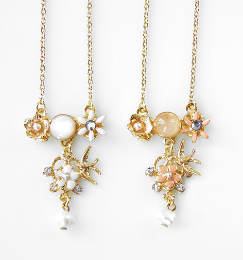 collier birdy disponible en blanc et en rose.